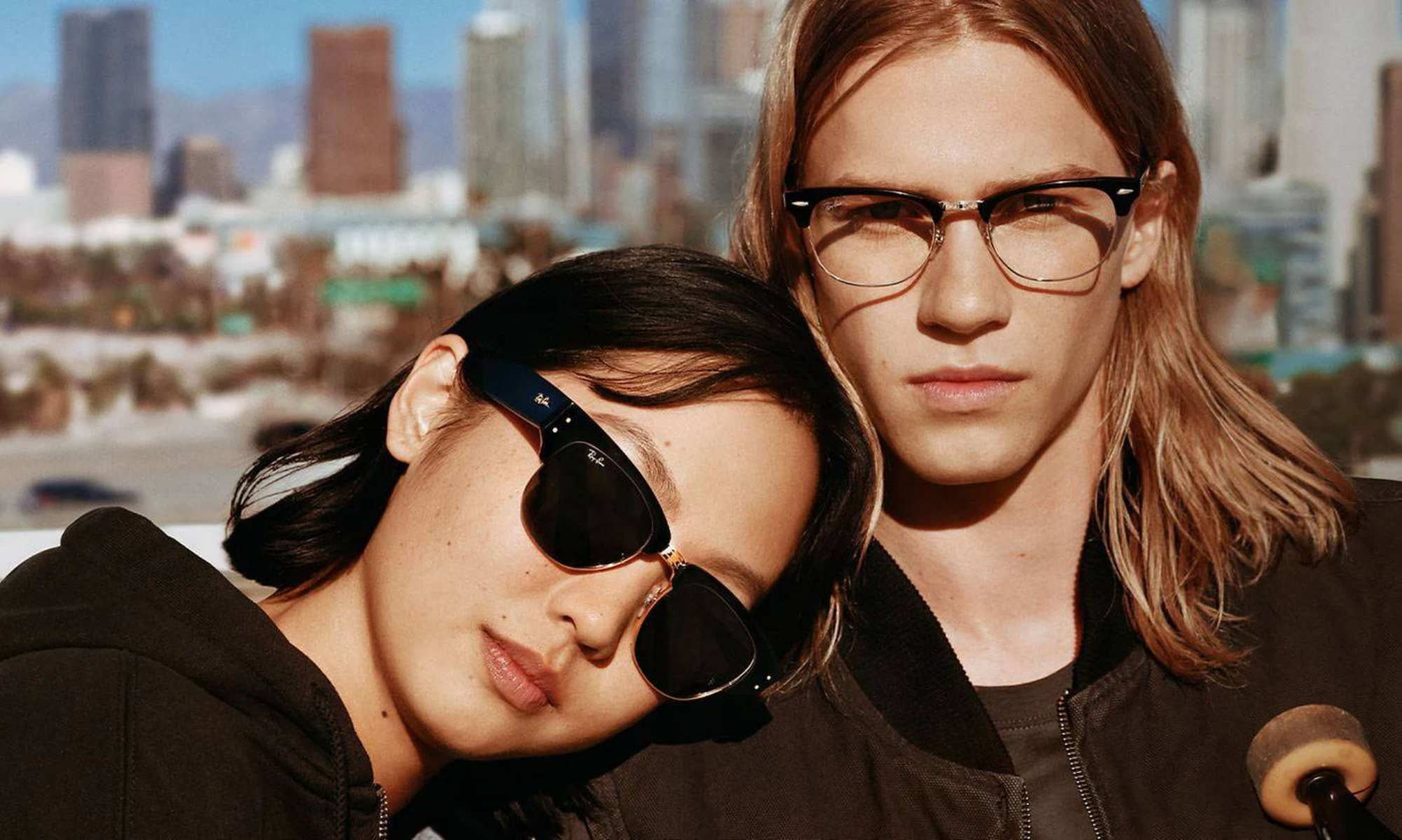 guy and girl model wearing ray ban anti reflective glasses